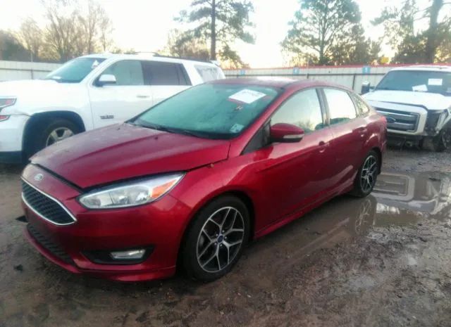 Photo 1 VIN: 1FADP3F22GL393537 - FORD FOCUS 