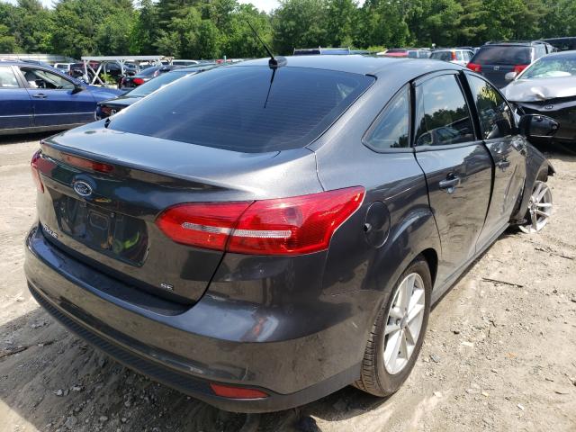 Photo 3 VIN: 1FADP3F22GL396616 - FORD FOCUS SE 