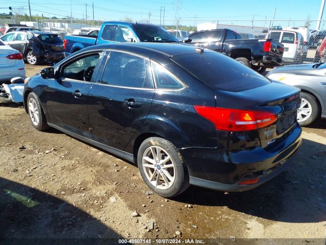 Photo 2 VIN: 1FADP3F22GL401491 - FORD FOCUS 