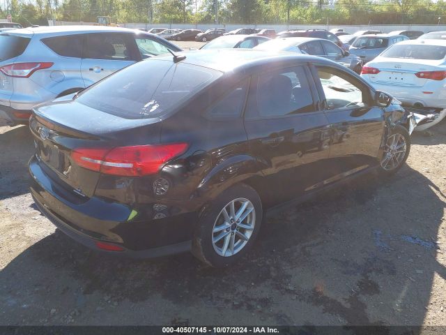 Photo 3 VIN: 1FADP3F22GL401491 - FORD FOCUS 