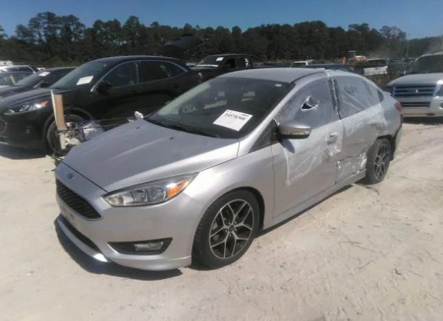 Photo 1 VIN: 1FADP3F22GL401913 - FORD FOCUS 