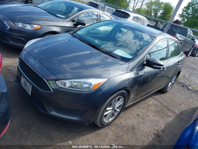 Photo 1 VIN: 1FADP3F22HL300615 - FORD FOCUS SE 