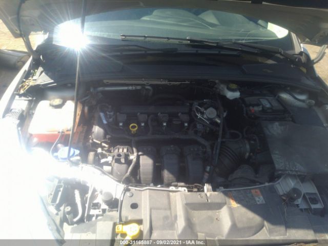 Photo 9 VIN: 1FADP3F22HL340788 - FORD FOCUS 