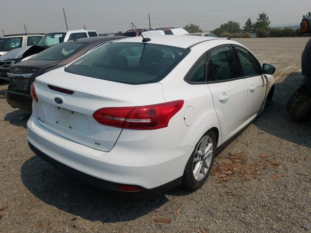 Photo 3 VIN: 1FADP3F22JL205977 - FORD FOCUS SE 