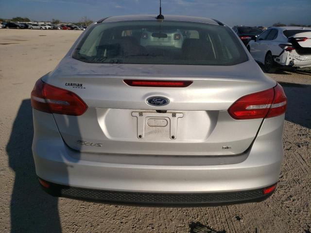 Photo 5 VIN: 1FADP3F22JL210841 - FORD FOCUS 