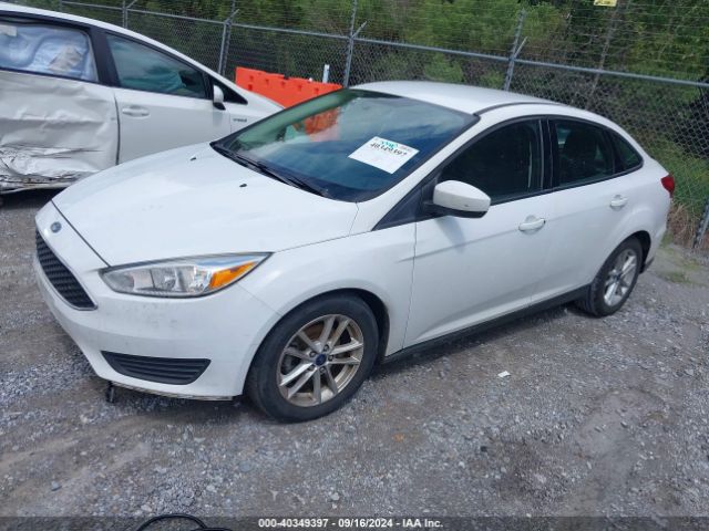 Photo 1 VIN: 1FADP3F22JL212279 - FORD FOCUS 