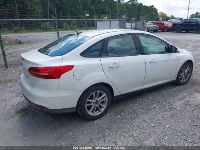 Photo 3 VIN: 1FADP3F22JL212279 - FORD FOCUS 