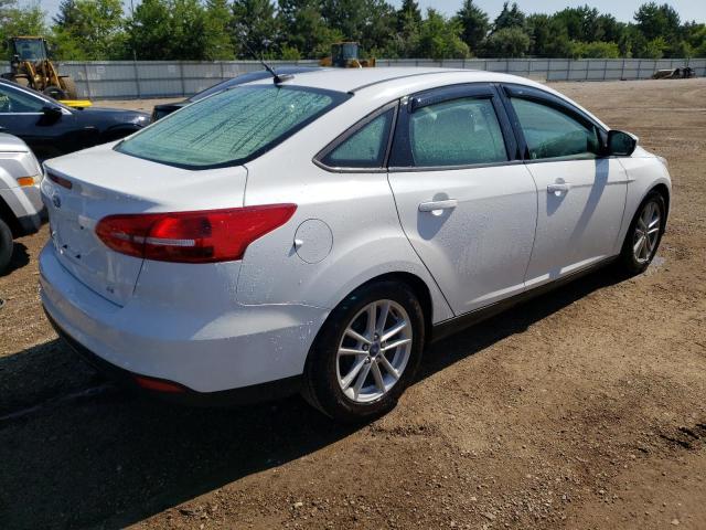 Photo 2 VIN: 1FADP3F22JL213013 - FORD FOCUS SE 