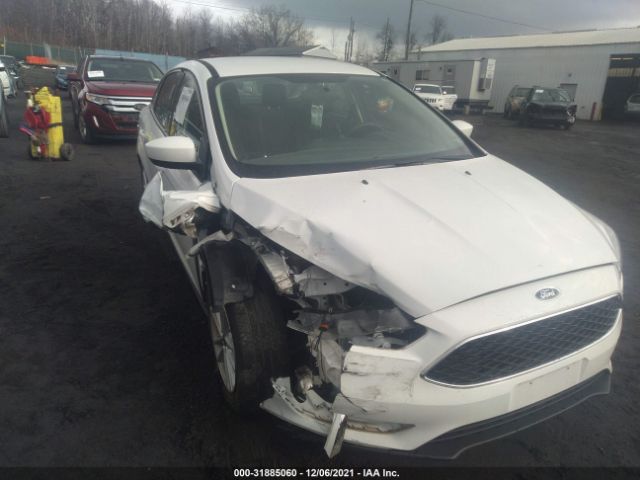 Photo 5 VIN: 1FADP3F22JL218311 - FORD FOCUS 