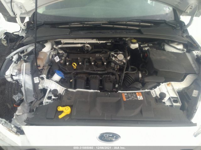 Photo 9 VIN: 1FADP3F22JL218311 - FORD FOCUS 