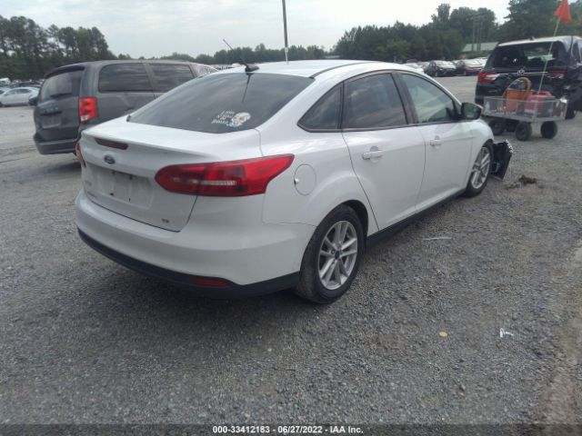 Photo 3 VIN: 1FADP3F22JL225338 - FORD FOCUS 