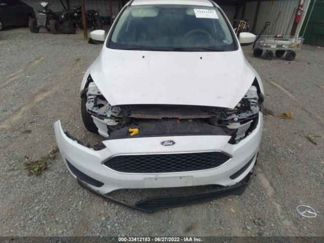 Photo 5 VIN: 1FADP3F22JL225338 - FORD FOCUS 