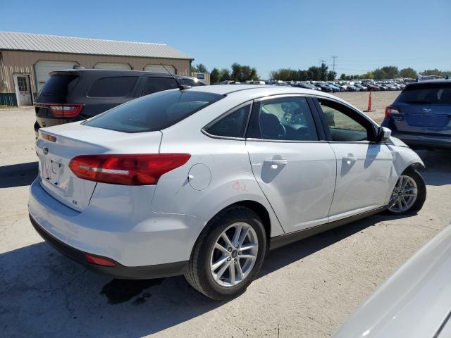 Photo 2 VIN: 1FADP3F22JL227929 - FORD FOCUS SE 