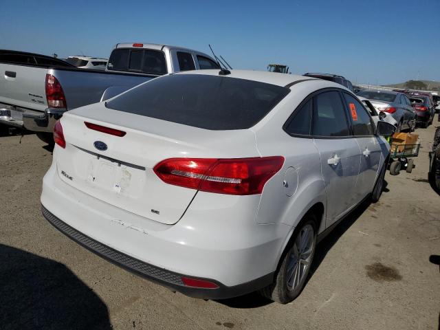 Photo 2 VIN: 1FADP3F22JL236677 - FORD FOCUS 