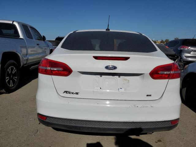 Photo 5 VIN: 1FADP3F22JL236677 - FORD FOCUS 