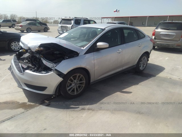 Photo 1 VIN: 1FADP3F22JL240082 - FORD FOCUS 