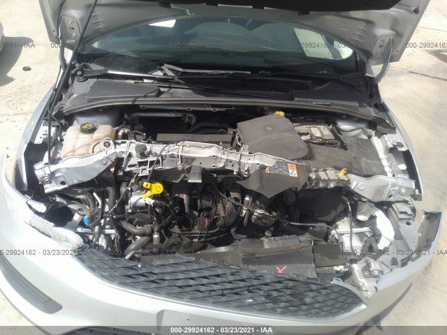 Photo 9 VIN: 1FADP3F22JL240082 - FORD FOCUS 