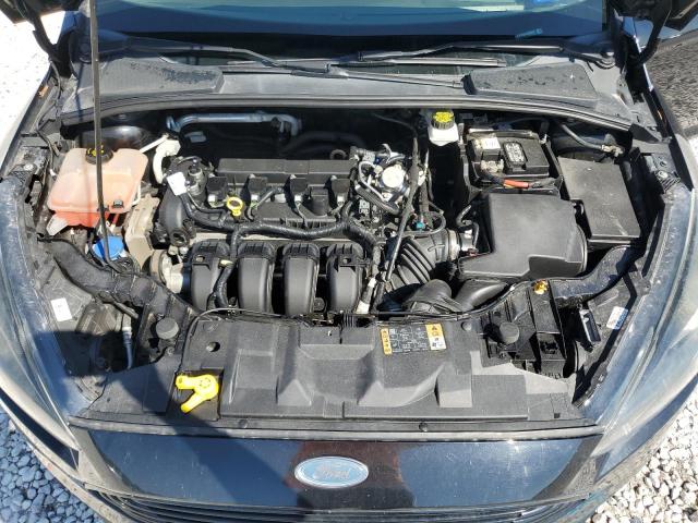 Photo 10 VIN: 1FADP3F22JL256525 - FORD FOCUS SE 