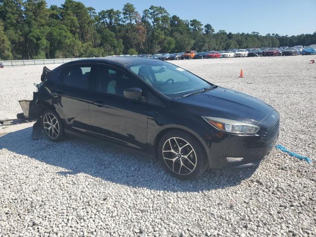 Photo 3 VIN: 1FADP3F22JL256525 - FORD FOCUS SE 