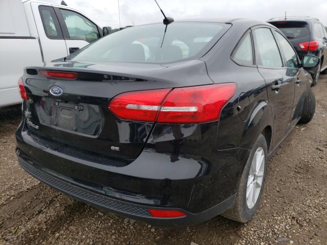 Photo 3 VIN: 1FADP3F22JL266942 - FORD FOCUS 