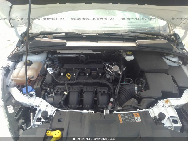 Photo 9 VIN: 1FADP3F22JL272711 - FORD FOCUS 