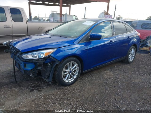 Photo 1 VIN: 1FADP3F22JL272885 - FORD FOCUS 