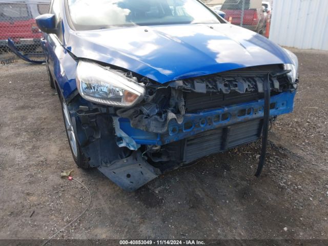 Photo 5 VIN: 1FADP3F22JL272885 - FORD FOCUS 