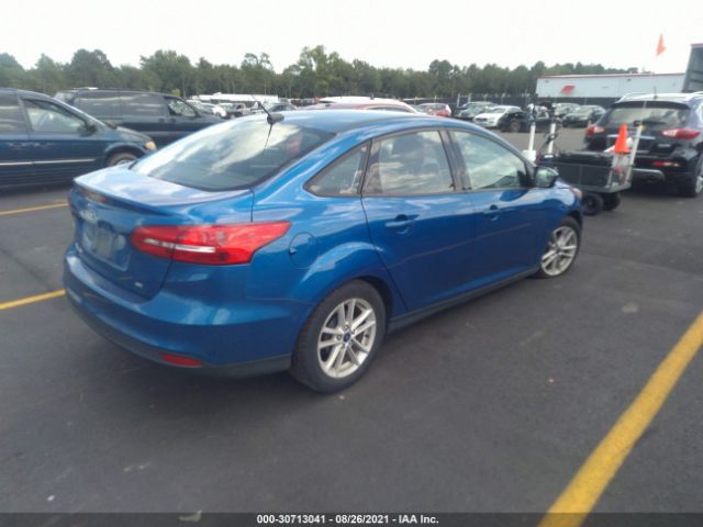 Photo 3 VIN: 1FADP3F22JL288987 - FORD FOCUS 