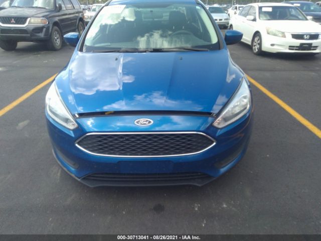 Photo 5 VIN: 1FADP3F22JL288987 - FORD FOCUS 