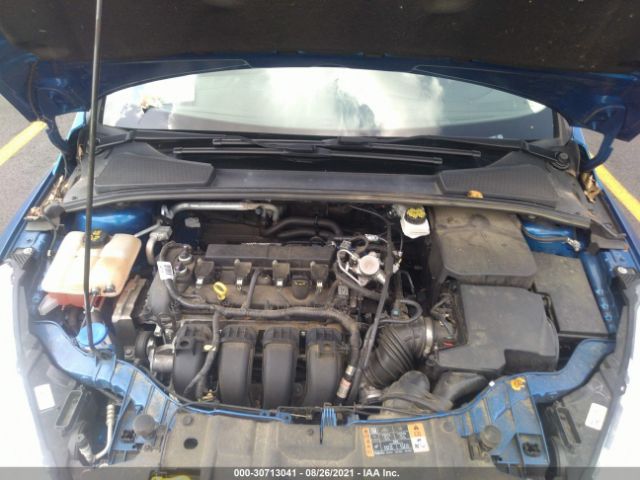 Photo 9 VIN: 1FADP3F22JL288987 - FORD FOCUS 