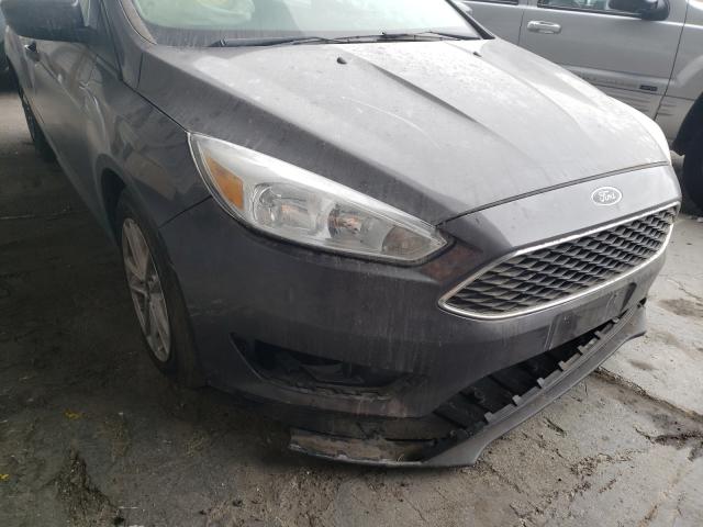 Photo 8 VIN: 1FADP3F22JL294837 - FORD FOCUS 