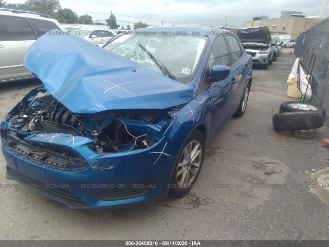 Photo 1 VIN: 1FADP3F22JL295776 - FORD FOCUS 