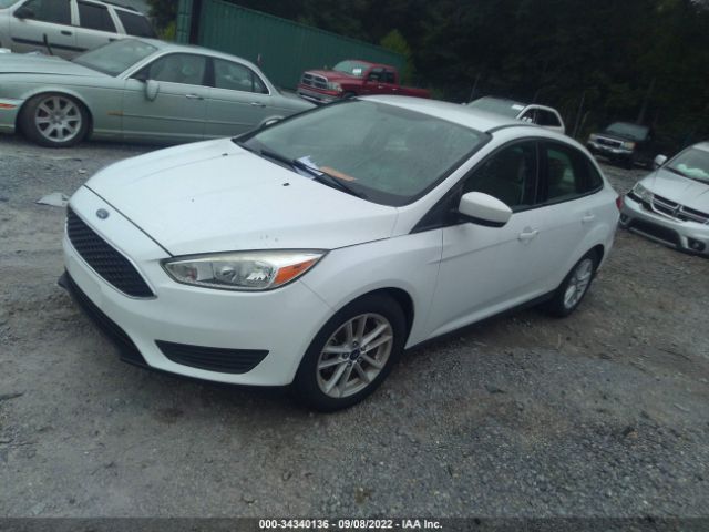 Photo 1 VIN: 1FADP3F22JL299181 - FORD FOCUS 