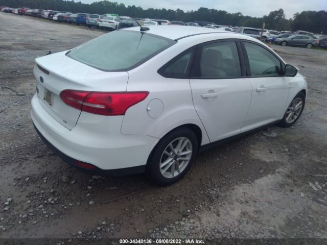 Photo 3 VIN: 1FADP3F22JL299181 - FORD FOCUS 