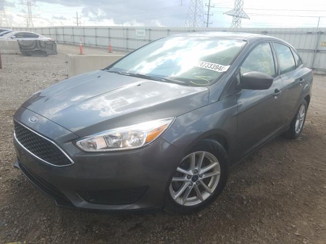 Photo 1 VIN: 1FADP3F22JL300491 - FORD FOCUS SE 