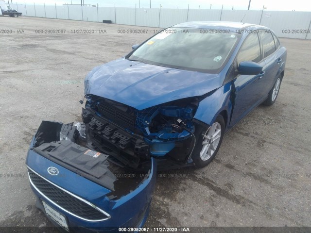 Photo 5 VIN: 1FADP3F22JL302273 - FORD FOCUS 