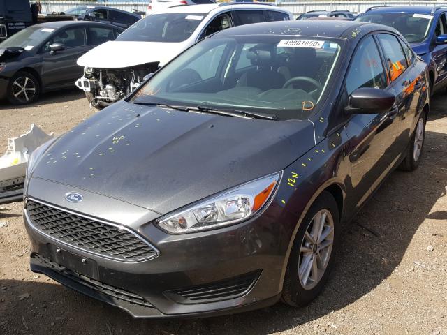 Photo 1 VIN: 1FADP3F22JL309854 - FORD FOCUS SE 