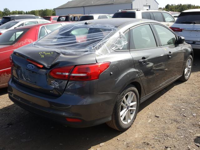 Photo 3 VIN: 1FADP3F22JL309854 - FORD FOCUS SE 