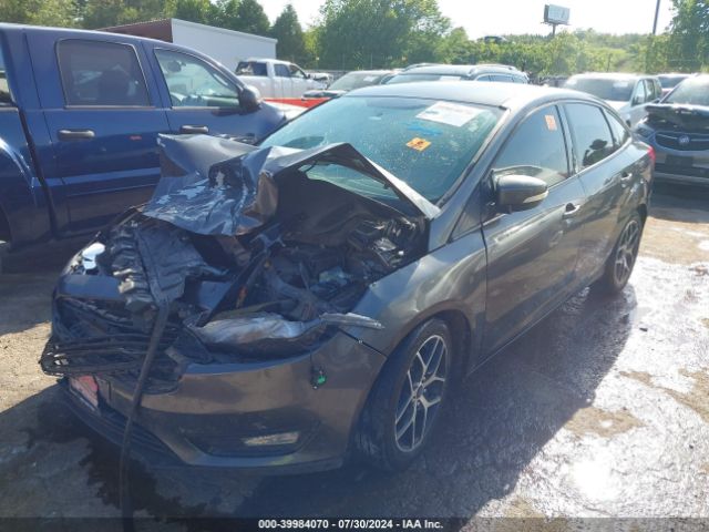 Photo 1 VIN: 1FADP3F22JL321812 - FORD FOCUS 