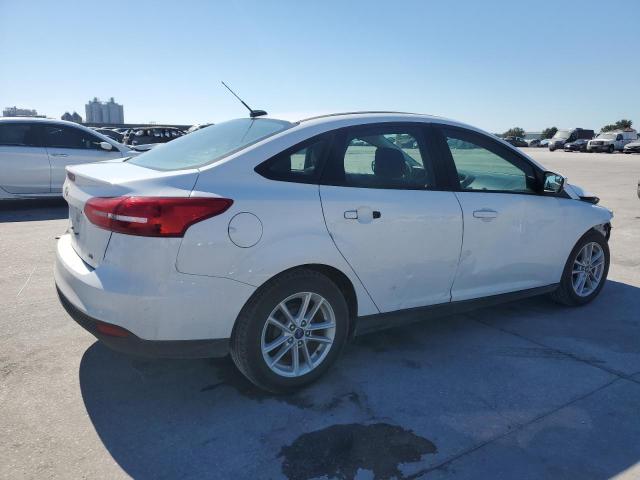 Photo 2 VIN: 1FADP3F22JL324144 - FORD FOCUS SE 