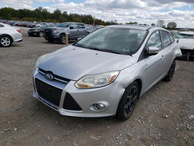 Photo 1 VIN: 1FADP3F23DL121557 - FORD FOCUS SE 