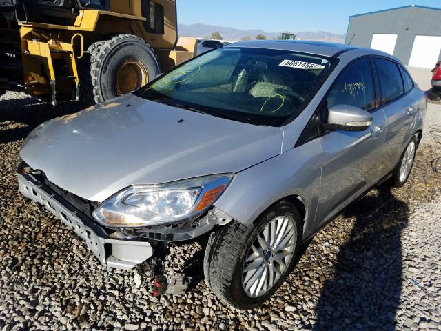 Photo 1 VIN: 1FADP3F23DL124636 - FORD FOCUS SE 