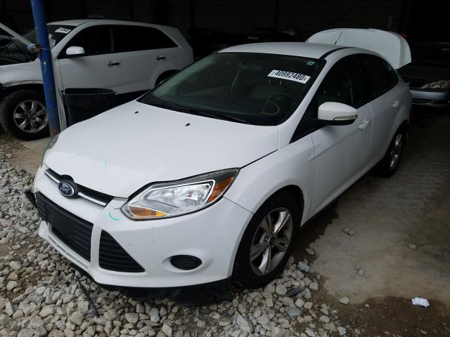 Photo 1 VIN: 1FADP3F23DL141405 - FORD FOCUS SE 