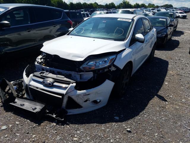 Photo 1 VIN: 1FADP3F23DL171732 - FORD FOCUS SE 