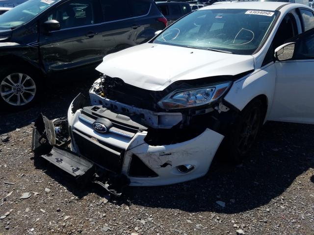 Photo 8 VIN: 1FADP3F23DL171732 - FORD FOCUS SE 