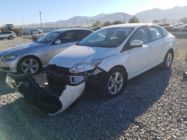 Photo 1 VIN: 1FADP3F23DL208911 - FORD FOCUS SE 