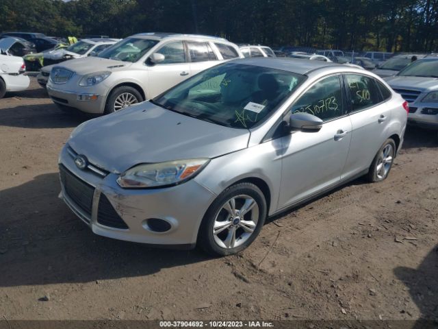 Photo 1 VIN: 1FADP3F23DL274231 - FORD FOCUS 