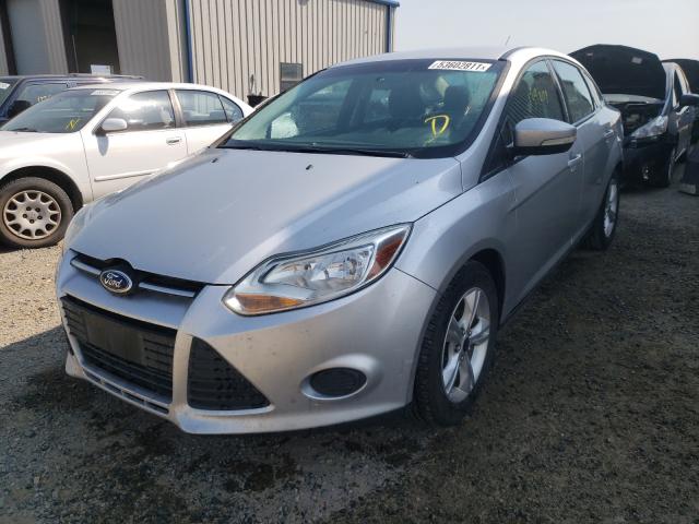 Photo 1 VIN: 1FADP3F23DL290297 - FORD FOCUS SE 