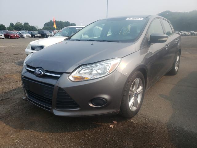 Photo 1 VIN: 1FADP3F23DL358727 - FORD FOCUS SE 