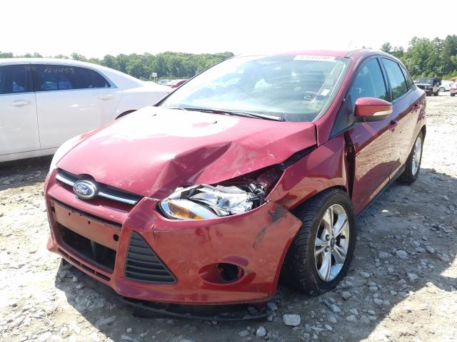 Photo 1 VIN: 1FADP3F23DL369386 - FORD FOCUS SE 